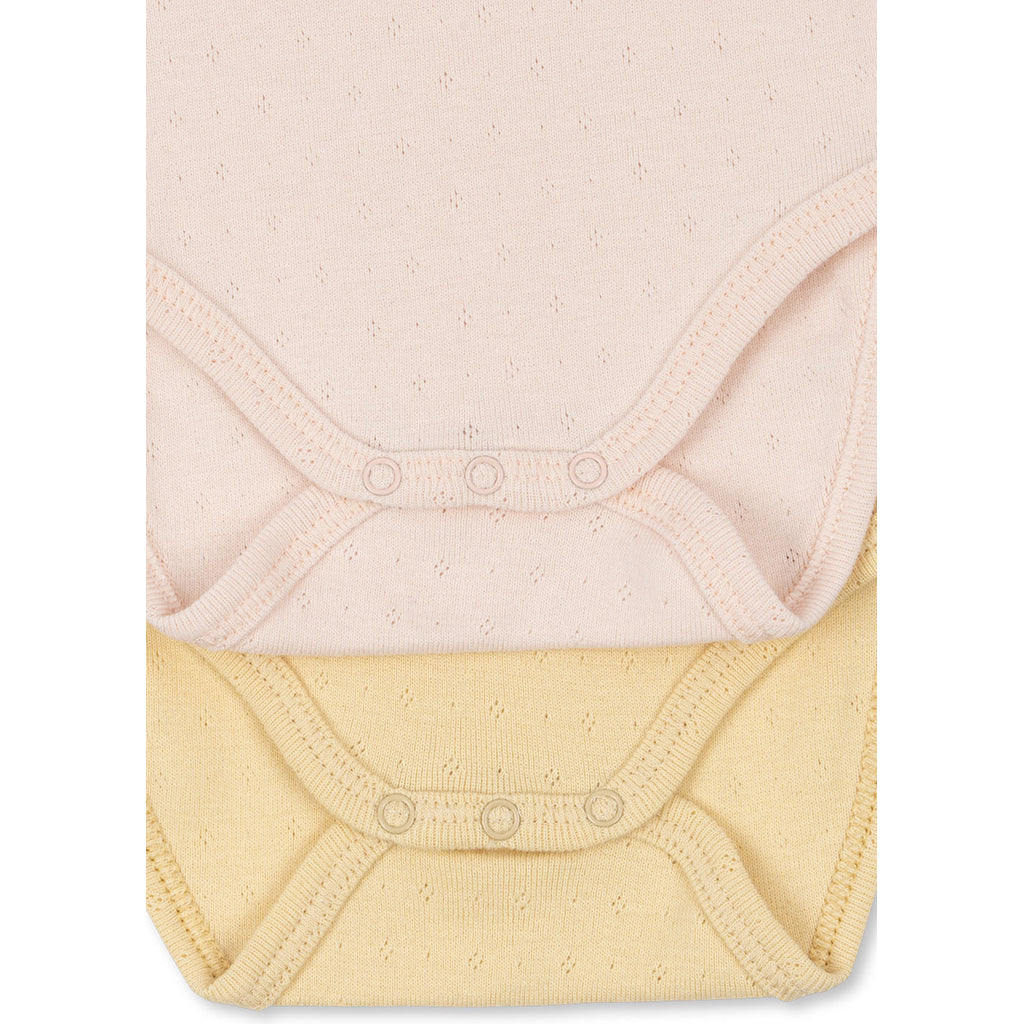 Fanga Fontana Perla bodystocking m. lange ærmer, 2-pak - Banana crepe/creole pink - str. 0-9 mdr.