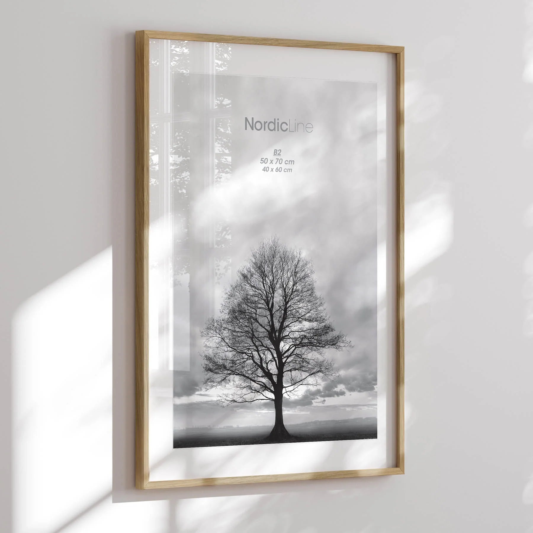 Frame crafted from solid oak, available in multiple sizes