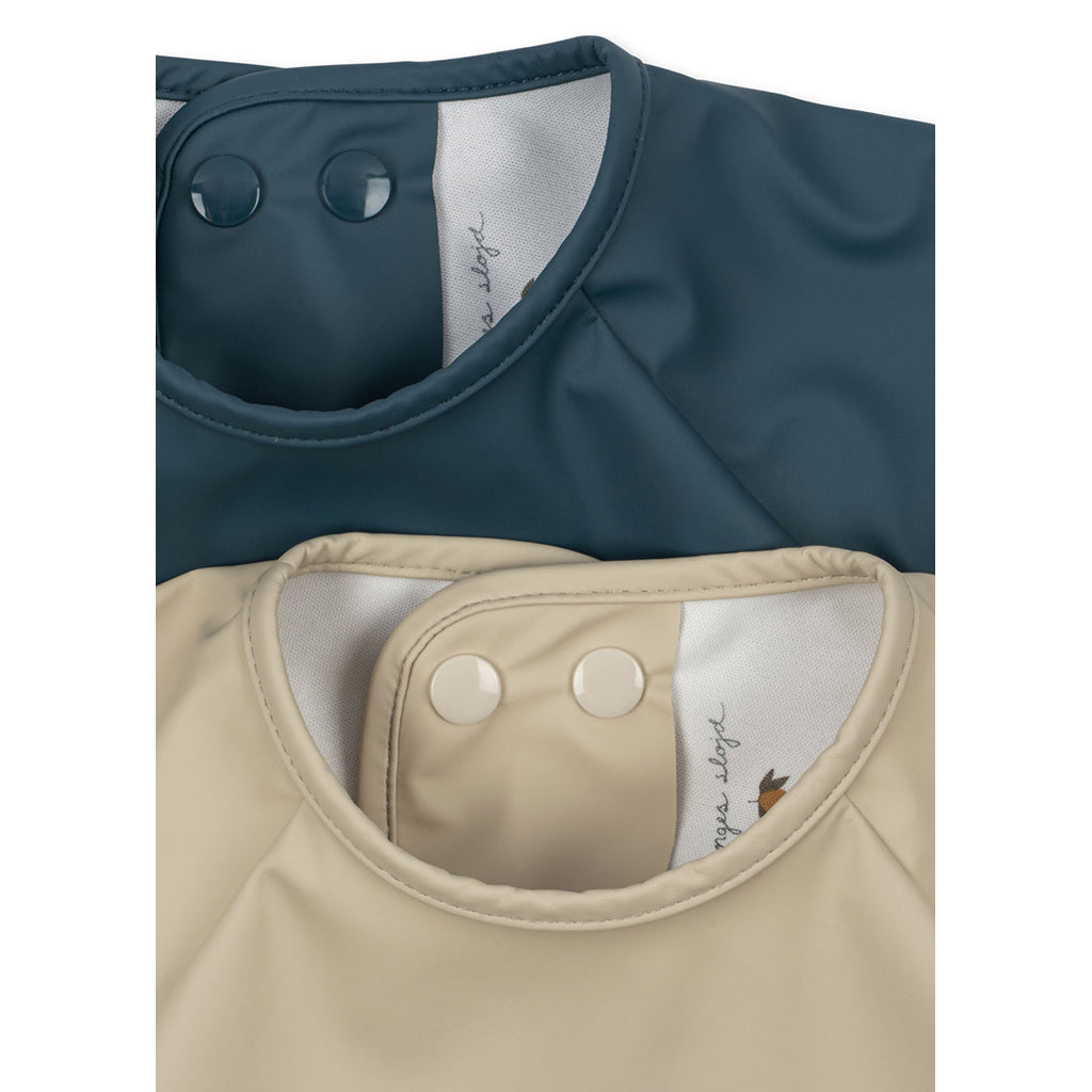Konges Sløjd Dinner Bib with Sleeves, PU - Tiger Rugitto