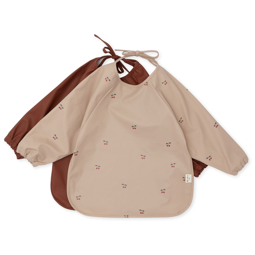 Konges Sløjd Dinner Bib with Sleeves, PU - Cherry