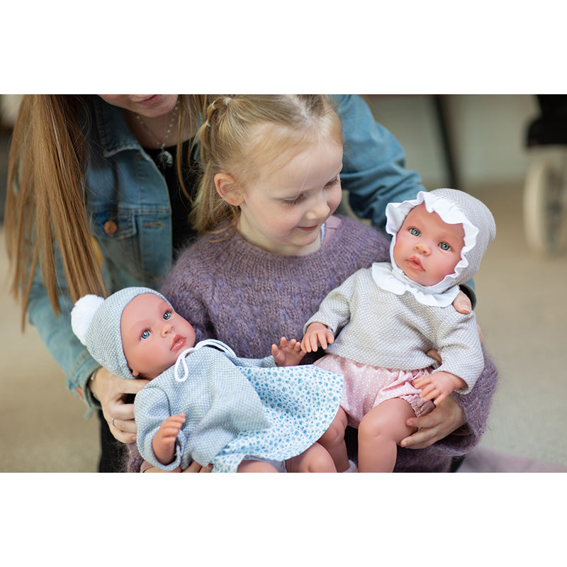 Así Leonora baby doll, 46 cm – Pink romper and beige blouse